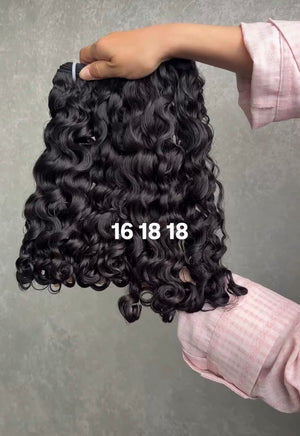 Extensions tissage bouncy curly — cheveux bruts